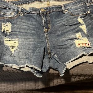 Distressed blue jean shorts
